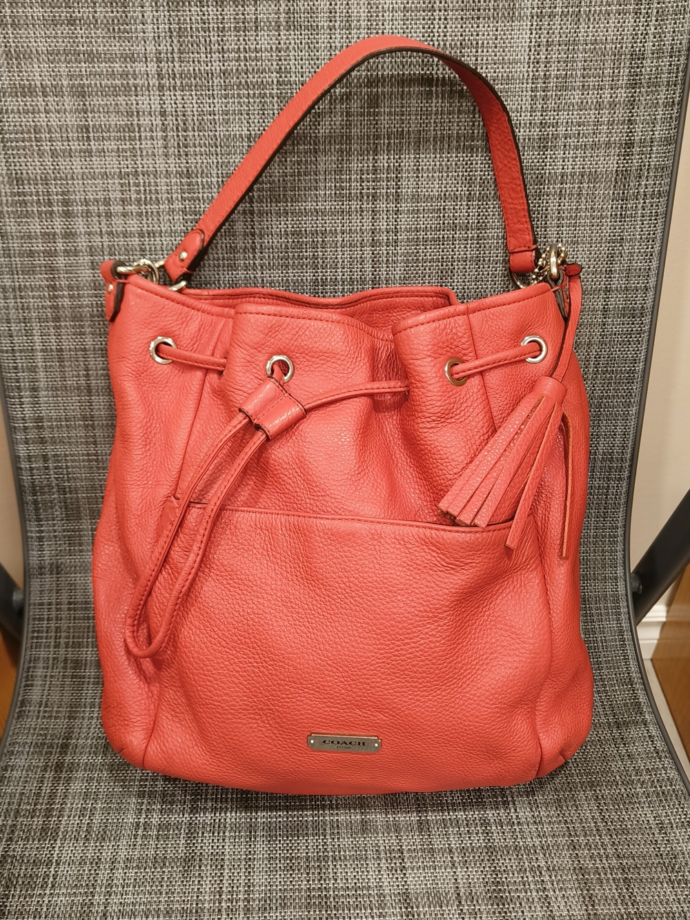 Coach Coral-Red Pebbled Leather Drawstring Hobo with Tassel